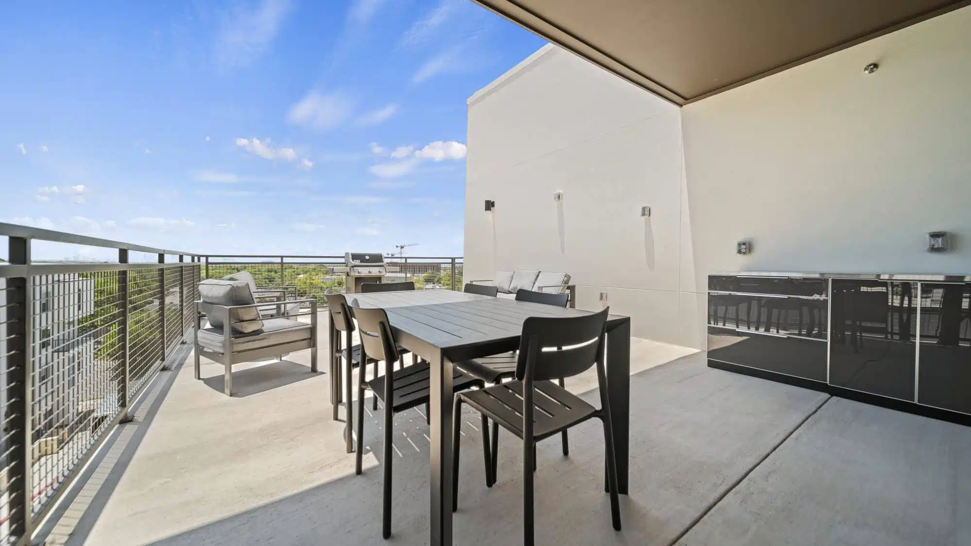 Upgrade Your Weekends with These Amenities - The Johnny communal balcony area.